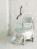 Picture of Etac Clean Shower Commode chair, 21.75", lagoon green 4 lockable castors